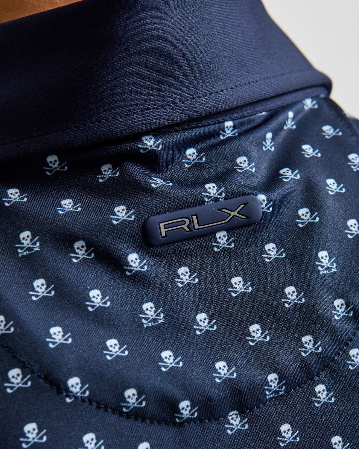 RLX Tailored Fit Airflow Polo Refined Navy Skull And Clubs