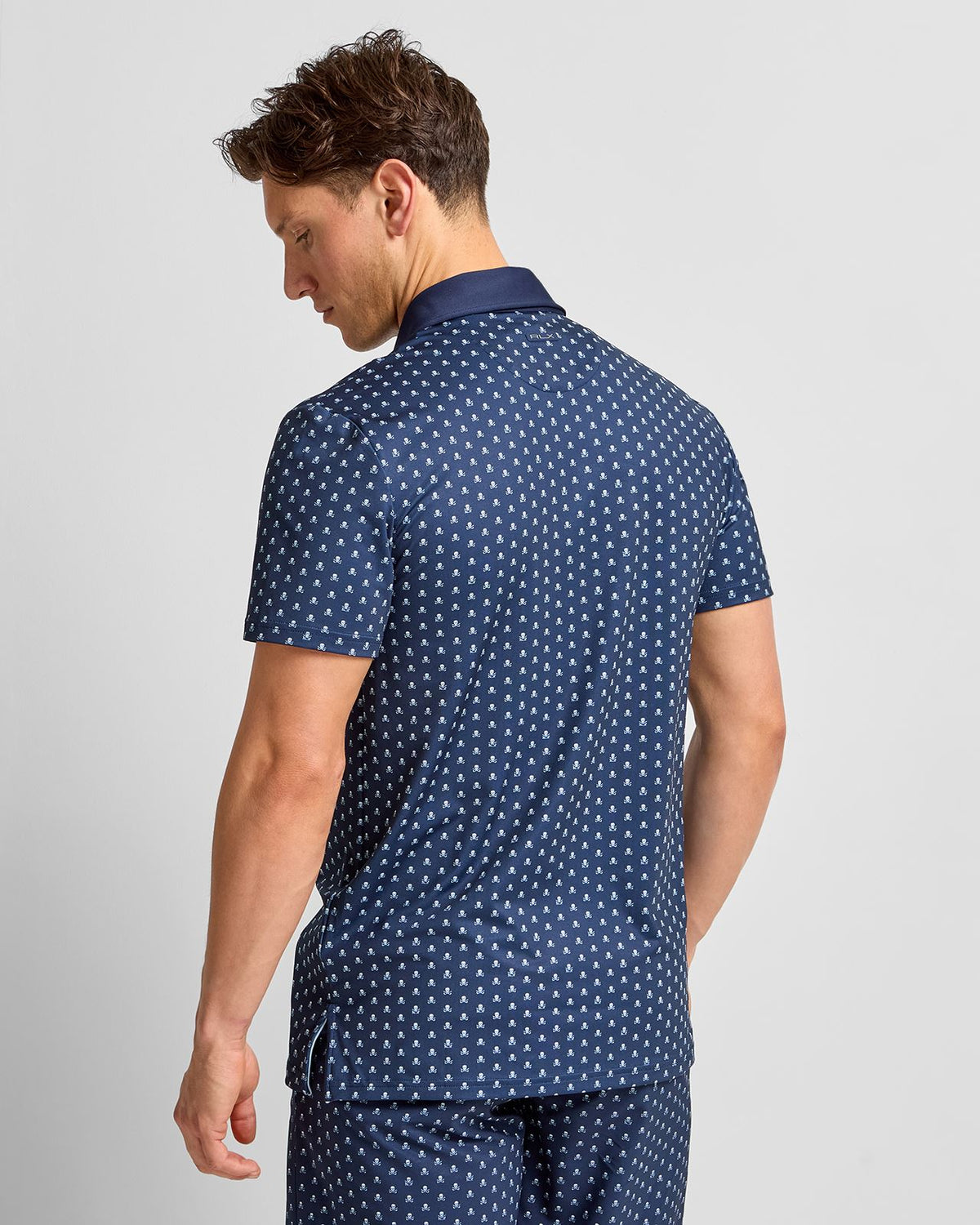 RLX Tailored Fit Airflow Polo Refined Navy Skull And Clubs